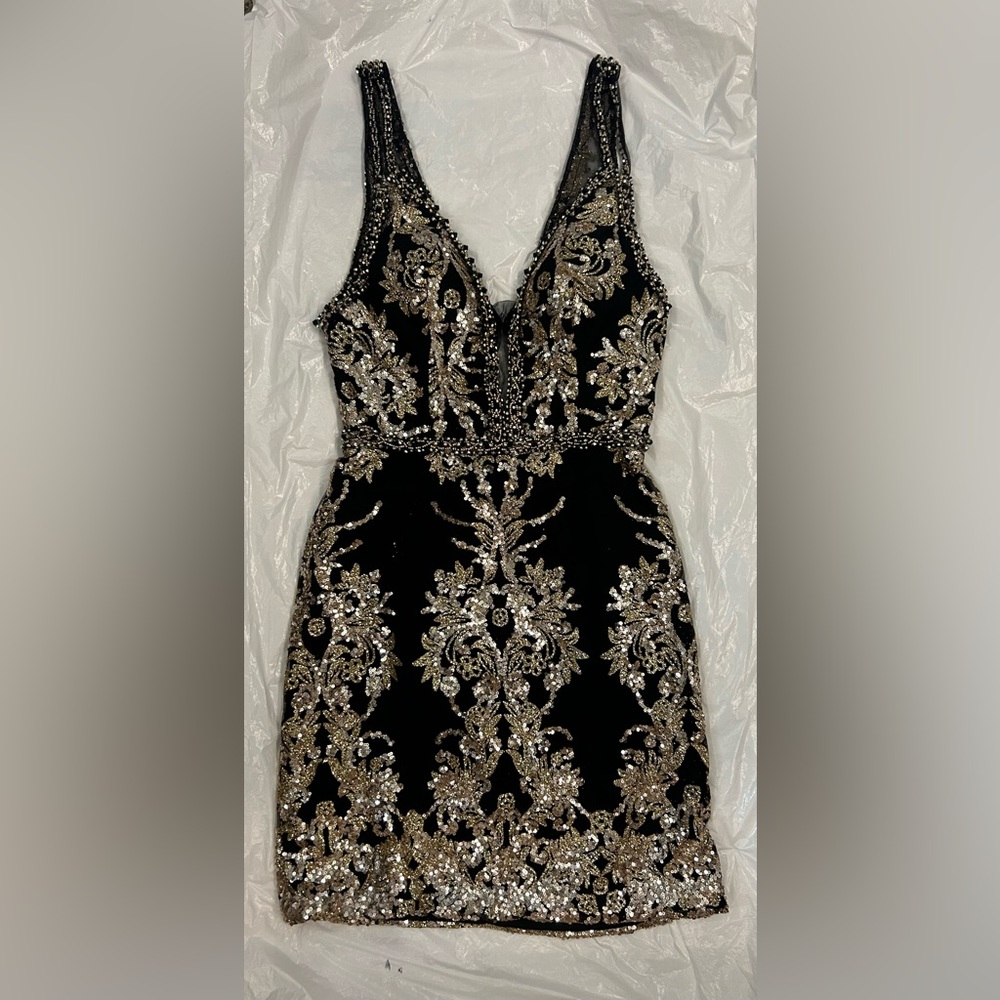 Black and gold beaded JVN by Jovani homecoming dress